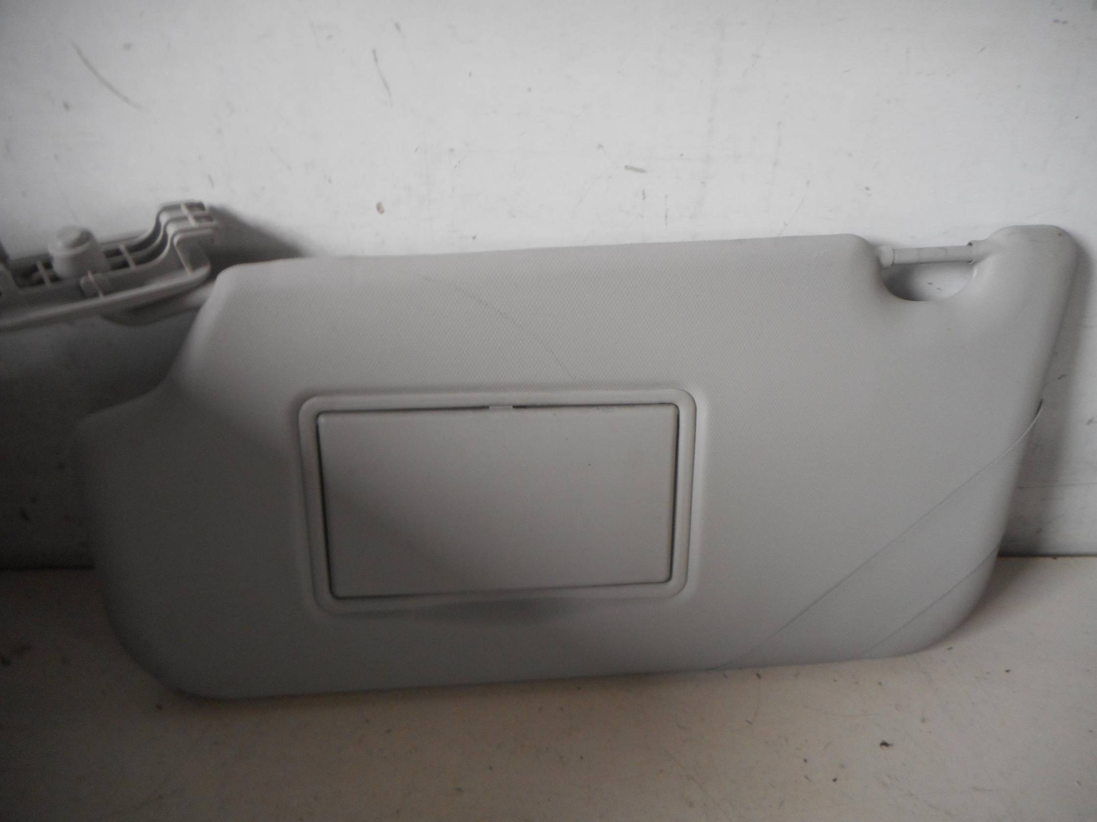 Aletta parasole parabrezza sx.